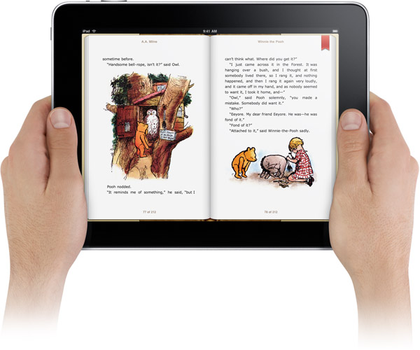 Mãos segurando iPad com iBooks aberto