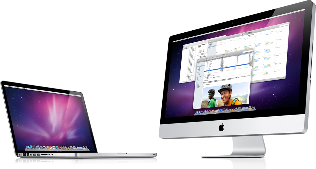 MacBook Pro ao lado de iMac