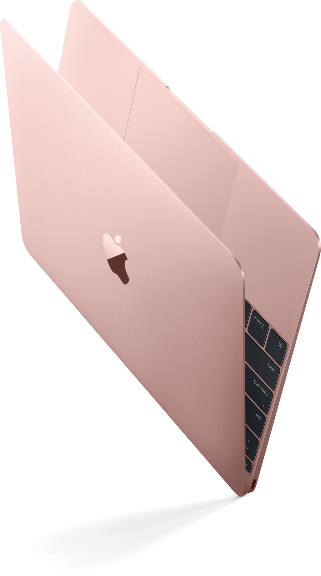 MacBook ouro rosa inclinado na diagonal e de lado
