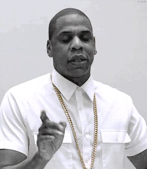 Jay-Z faz gesto negativo