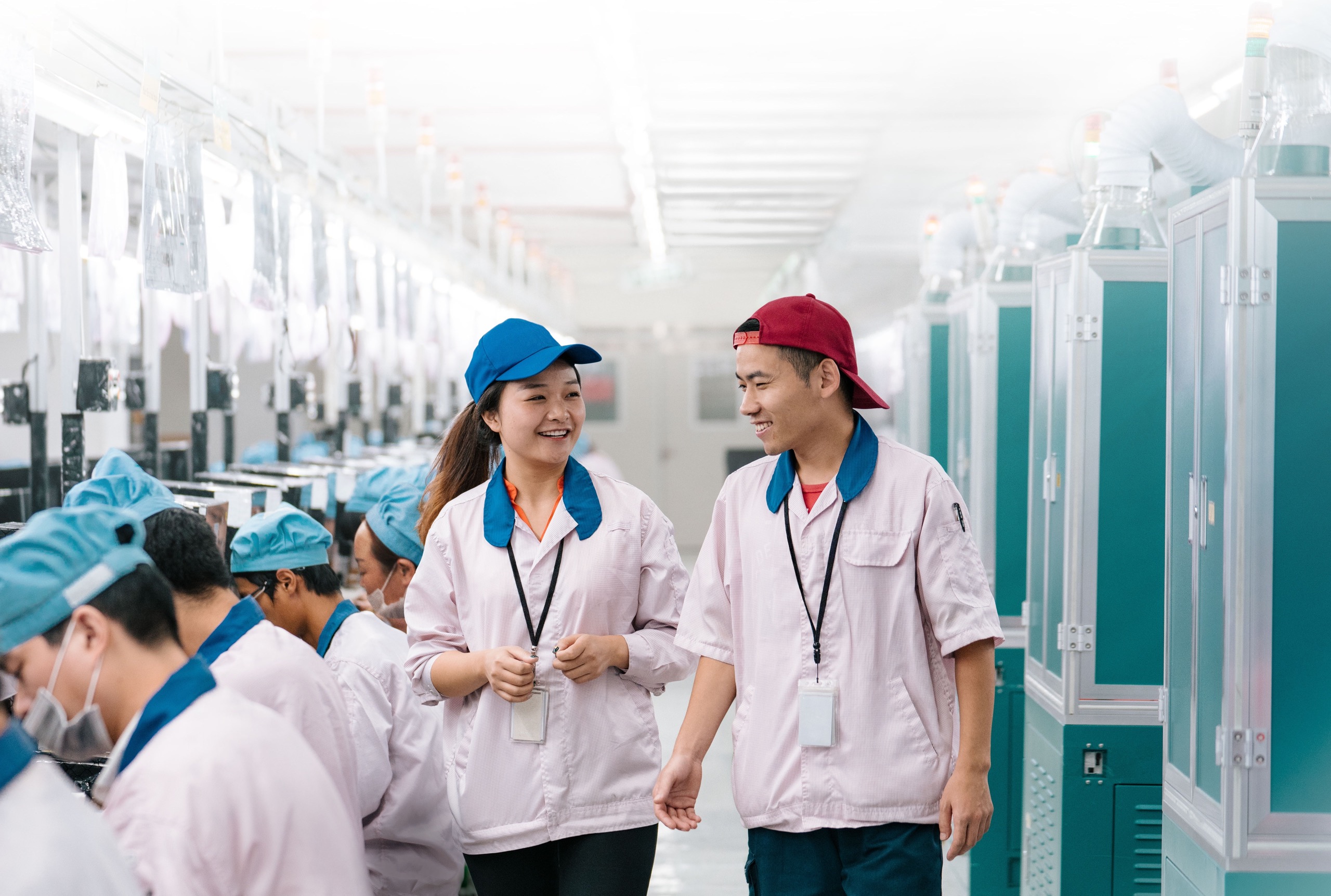 Gerentes da linha de produção do iPhone na China