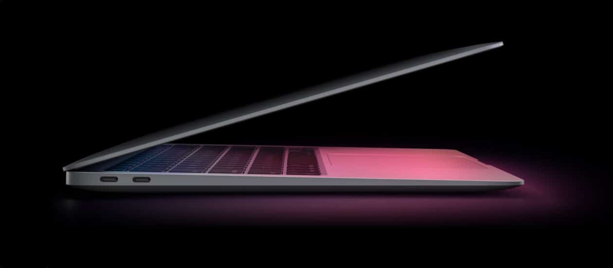 New MacBook Air with Apple M1 chip from the side on a dark background