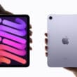 iPads mini segurados por mãos ao contrário
