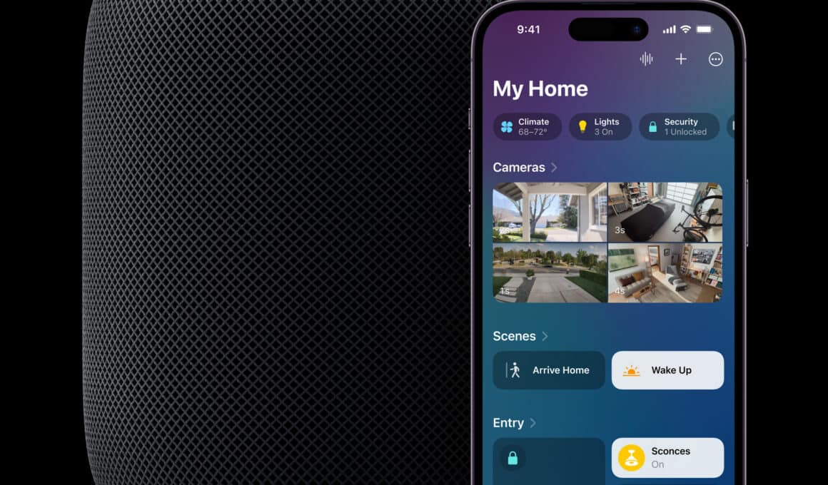 HomePod na cor meia-noite ao lado de iPhone sendo usado com o app Casa (Home)