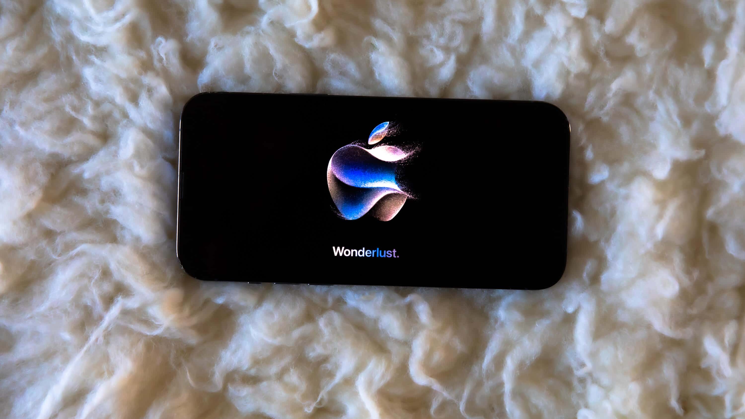 Logo do evento Wonderlust em um iPhone