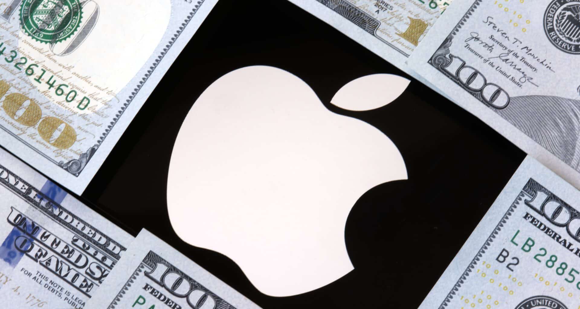 Logo da Apple cercado por notas de dólares